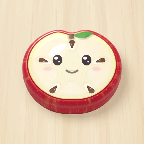 A jelly apple with a smiling face on a wooden board