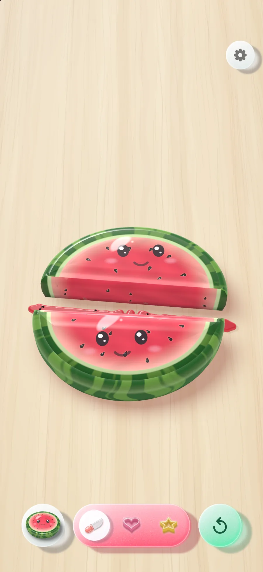 A jelly watermelon cut in two with a knife, both halves smiling, red slime and pips spilling onto the board