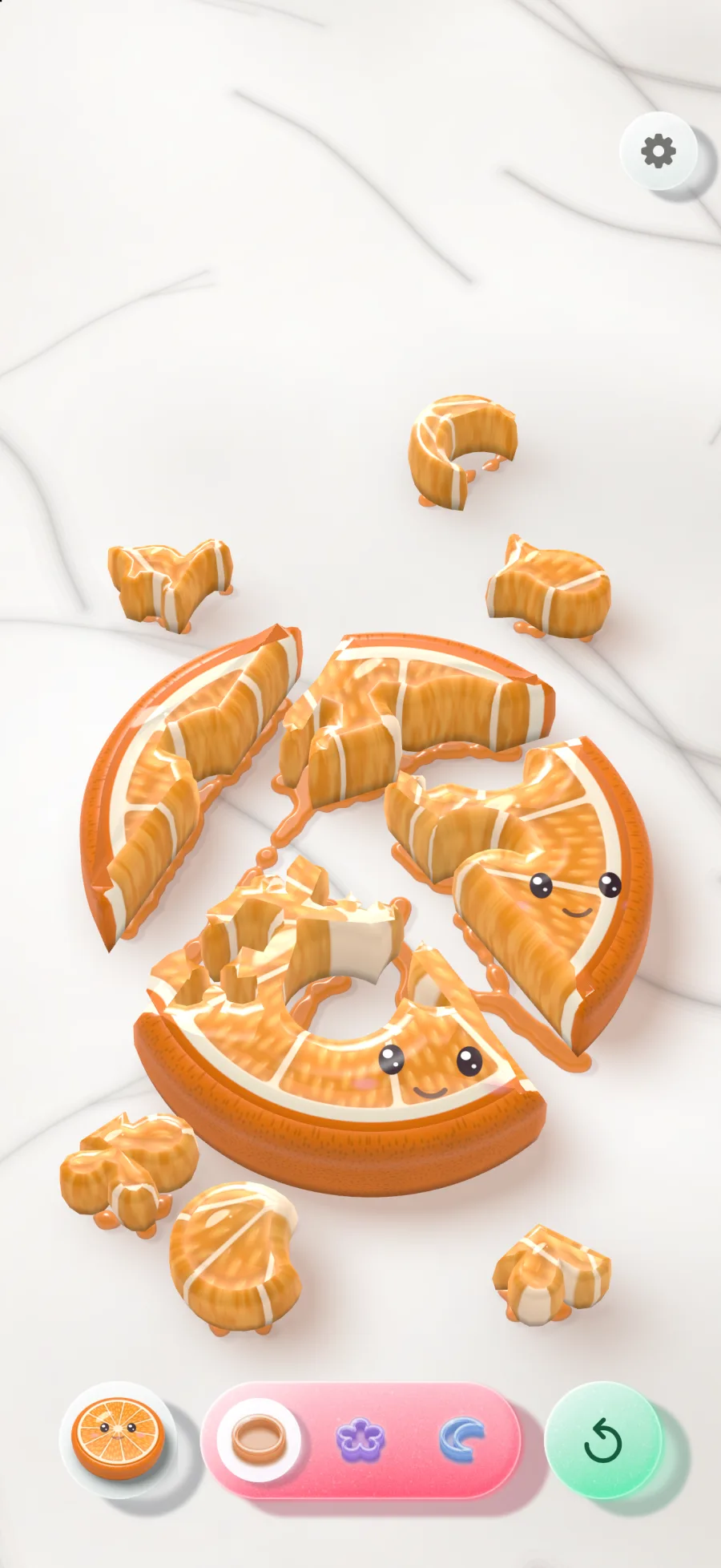 A jelly orange on white marble with cookie-cutter shapes punched out of it, each little shape smiling